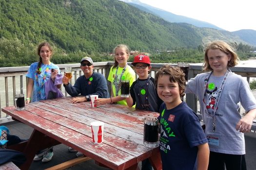 enjoying a beer after gold panning