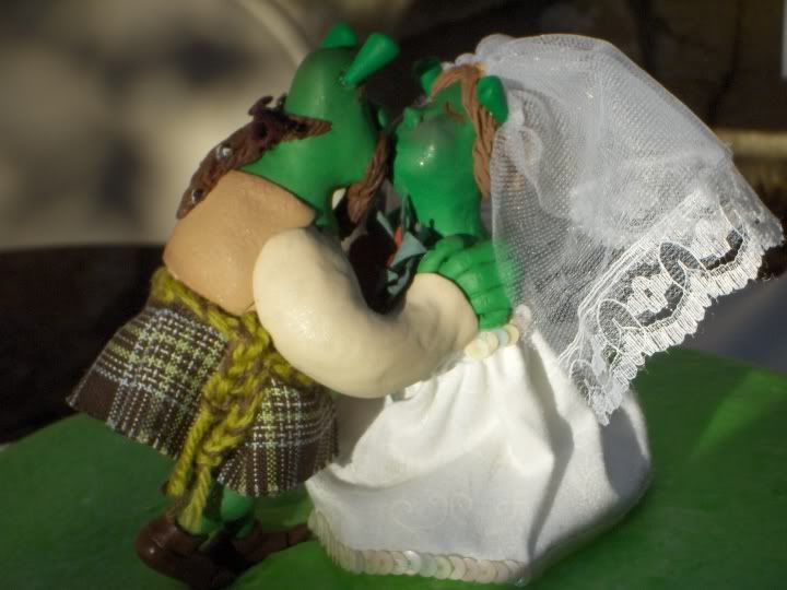 Cake topper I made it a combo of Shrek Coby and Fiona Lauren