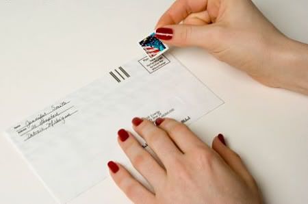 Stamping an envelope Photo from Getty Images
